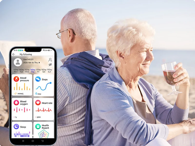 Older couple beside a mobile view of supported health readings