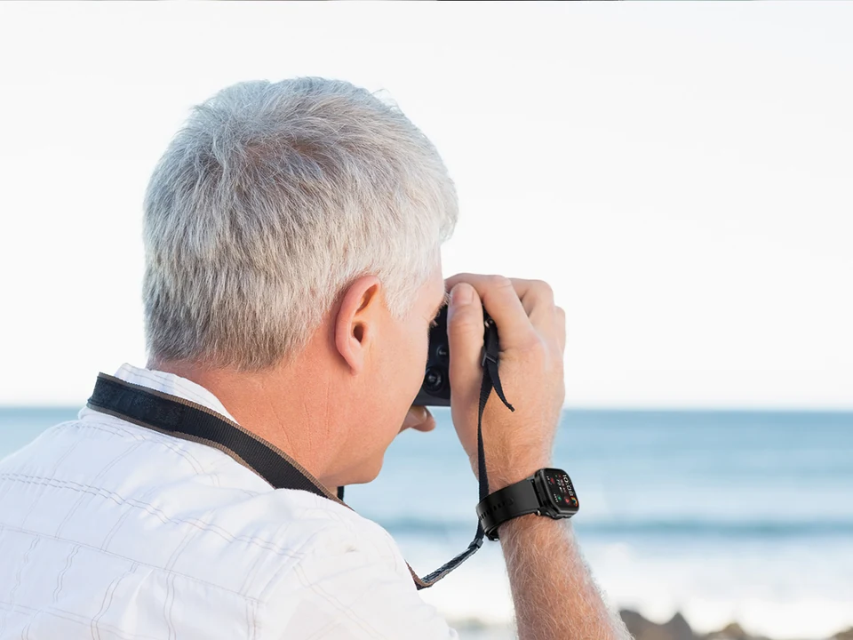 Older adult and family member connecting outdoors